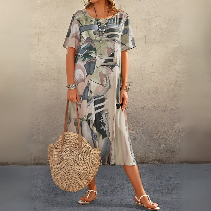 JOELLE | ELEGANT FLORAL DRESS IN A LIGHT AND CHIC STYLE